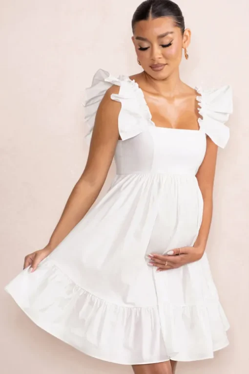 Dolly Daze | White Maternity Ruffle Sleeve Babydoll Mini Dress